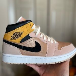 Used once Jordan 1 Mid in “Particle Beige”.